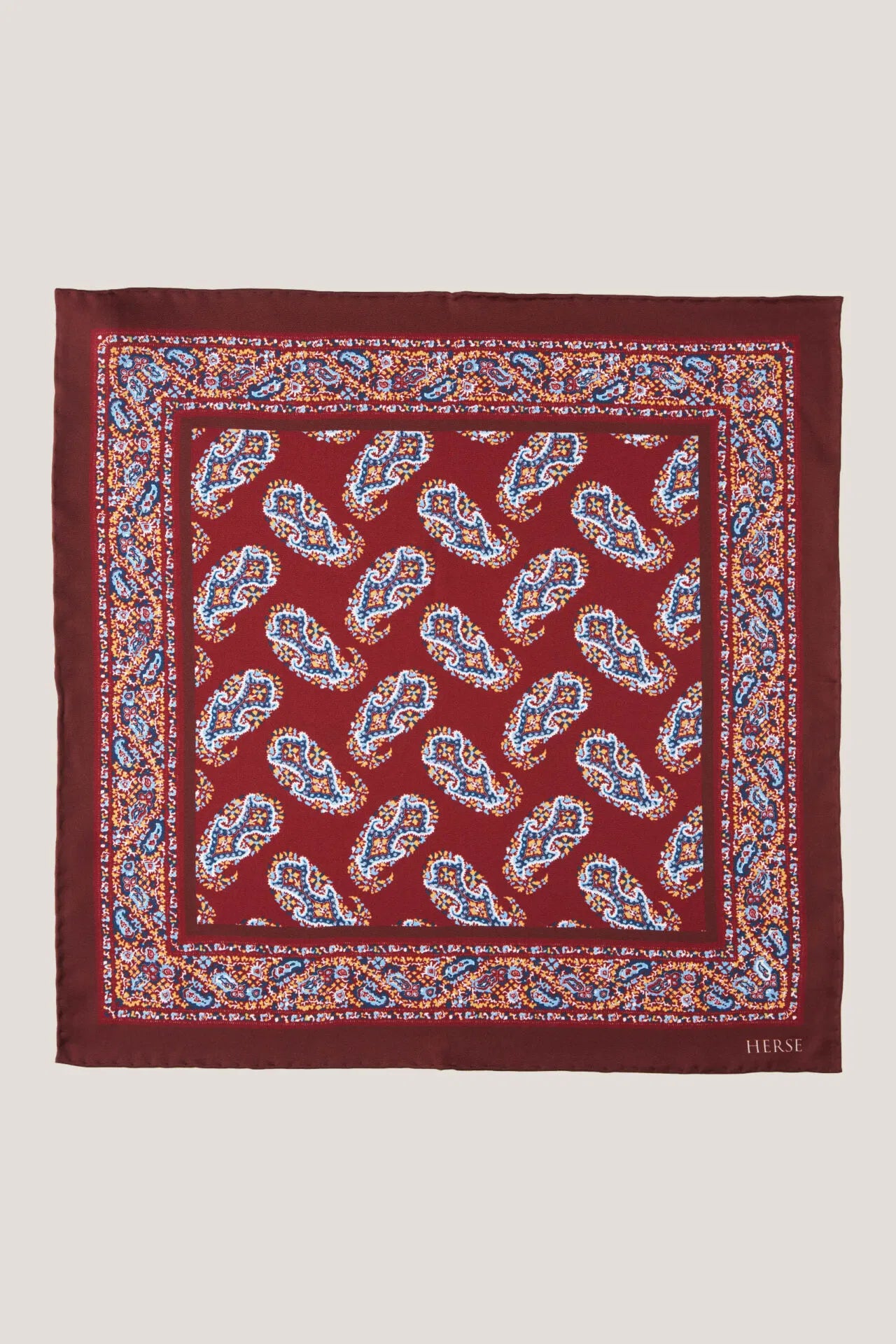 Silk pocket square with a regular paisley pattern