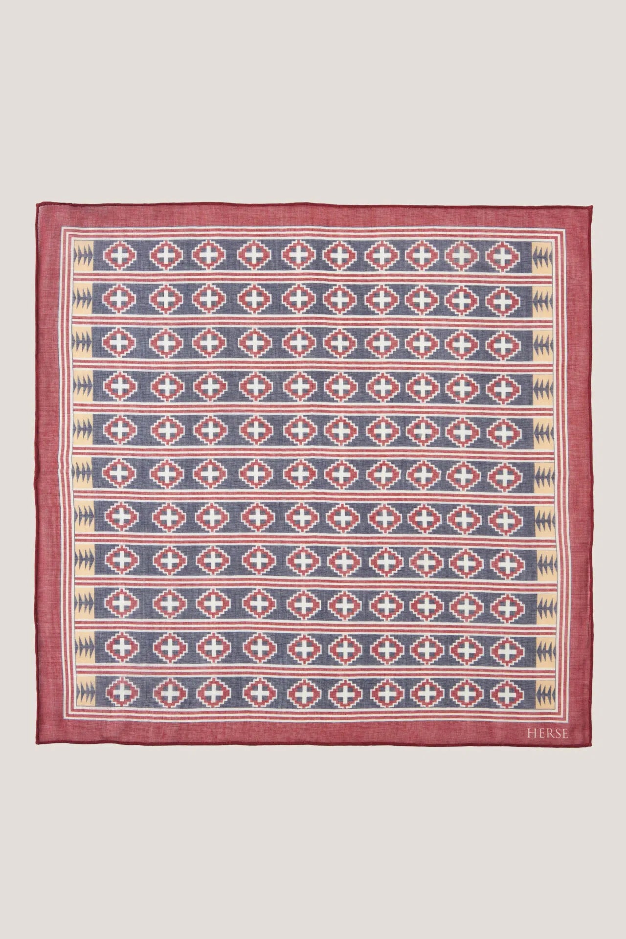 Pochette de costume bleu marine et bordeaux à motif ethnique horizontal
