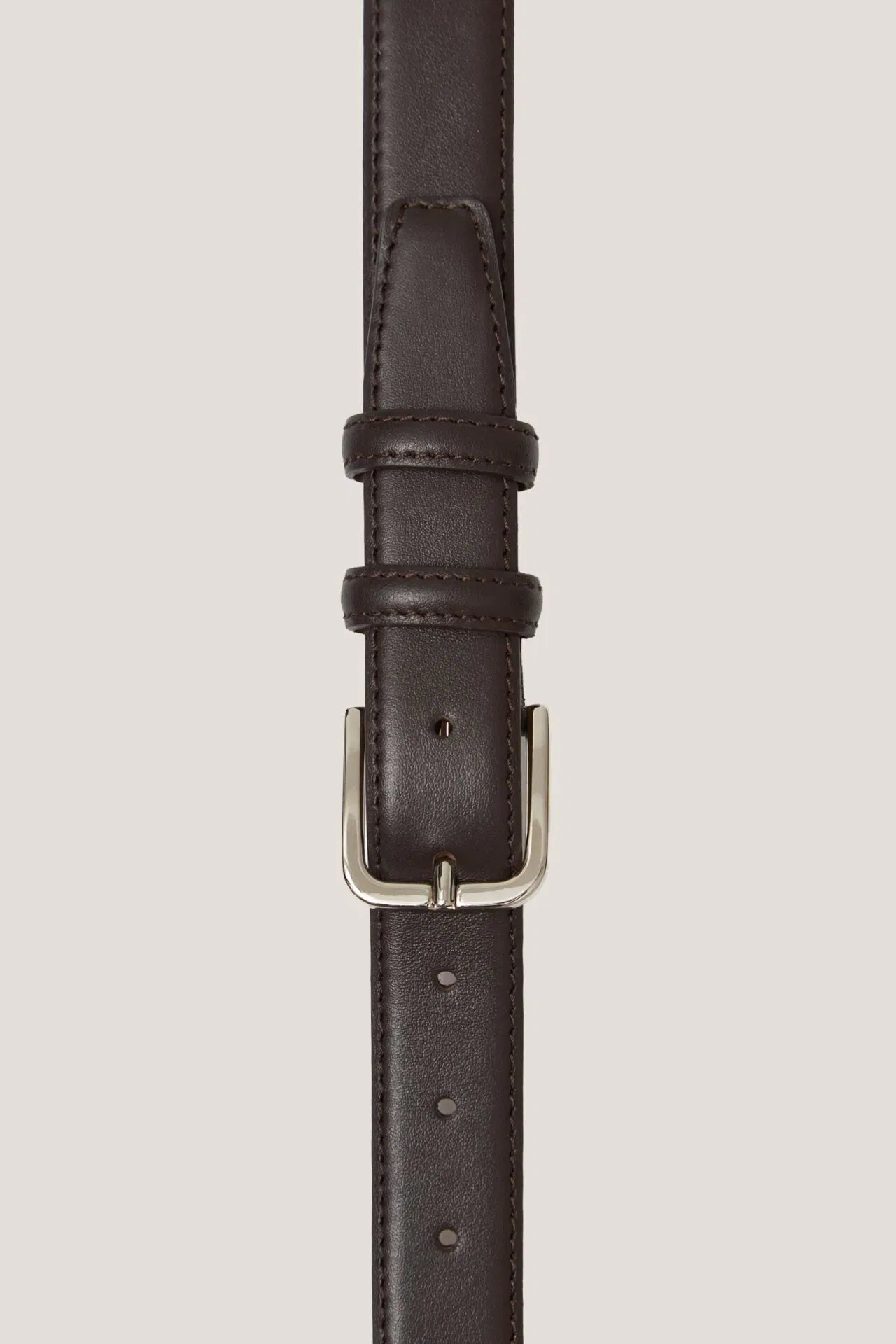 Formal leather belt with silver buckle