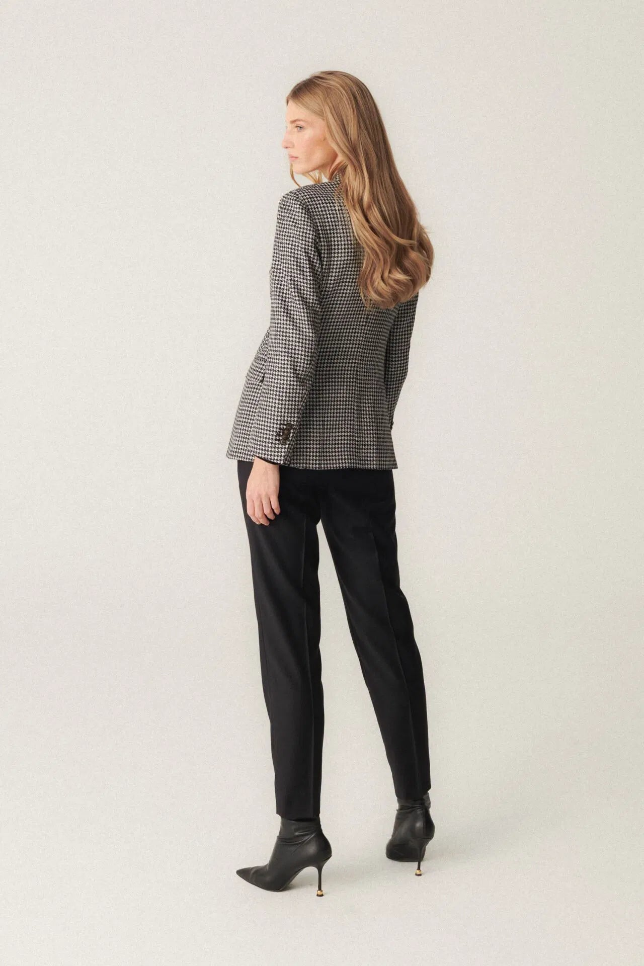 Black and white double-breasted jacket with houndstooth pattern
