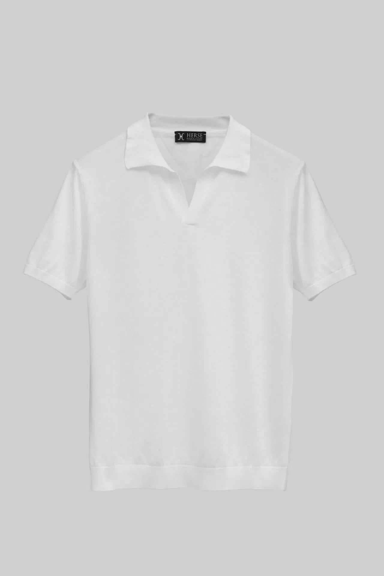 Polo en tricot blanc sans boutons