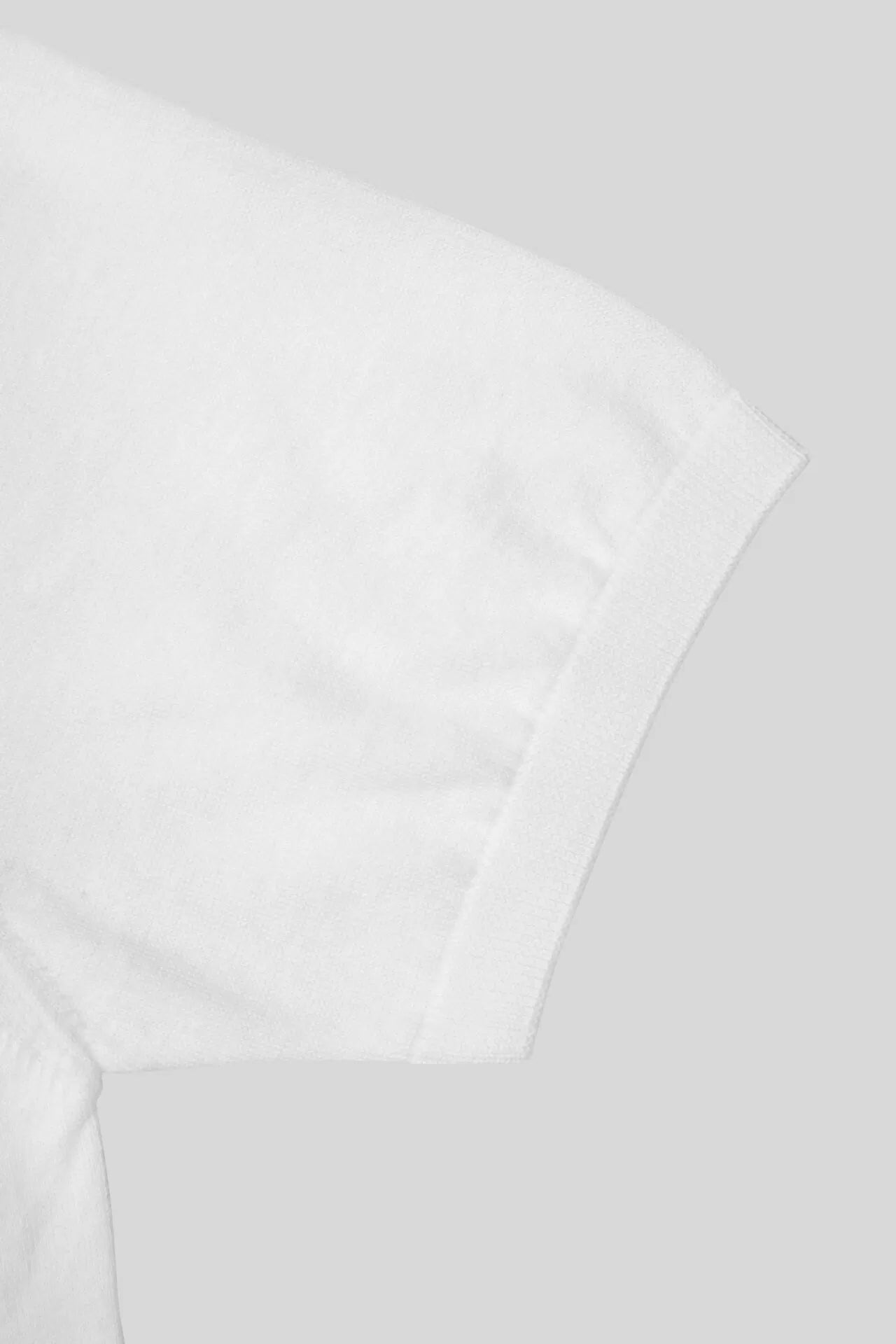 Polo en tricot blanc sans boutons