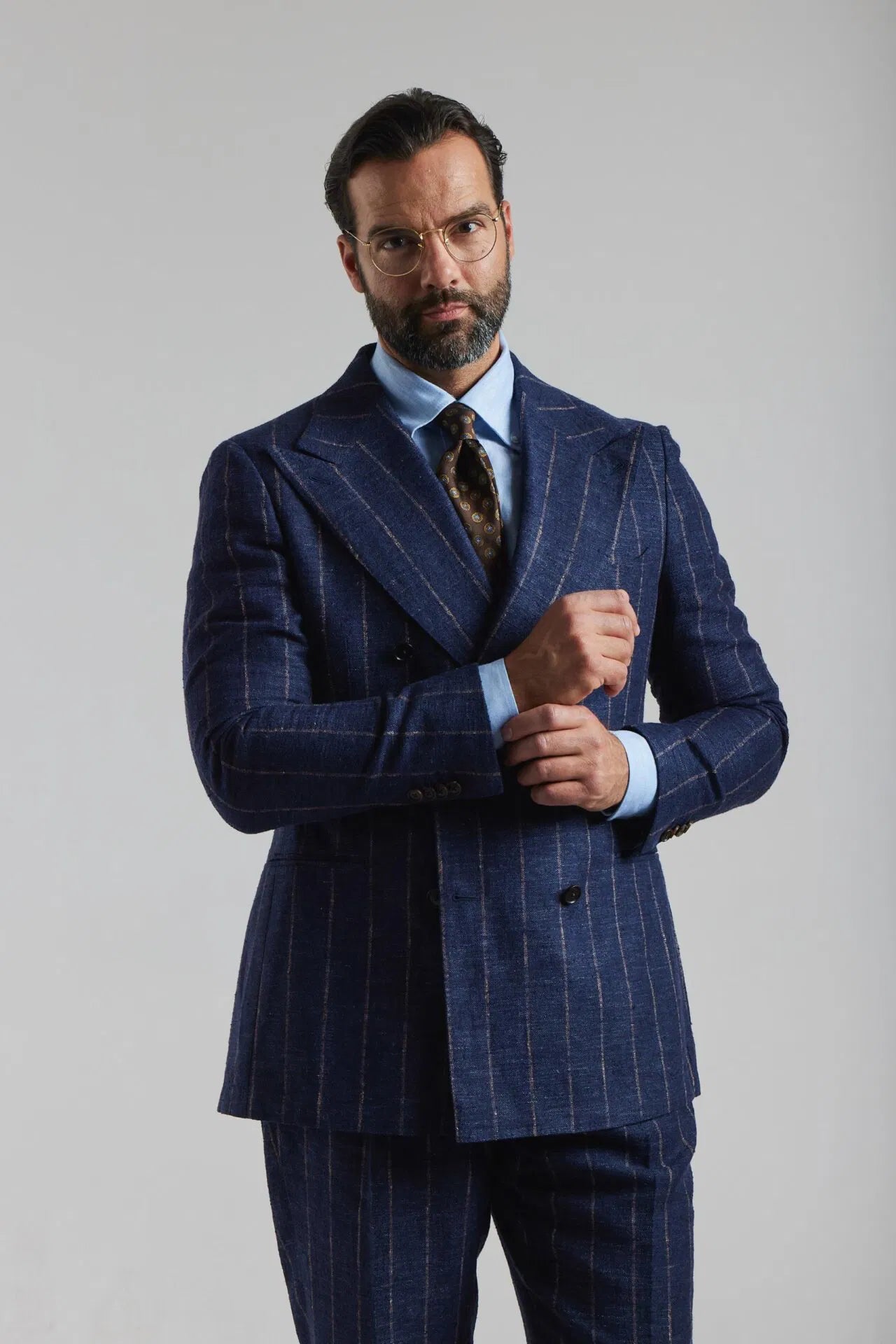 Navy blue double-breasted suit in Ferla fabric with a pinstripe pattern