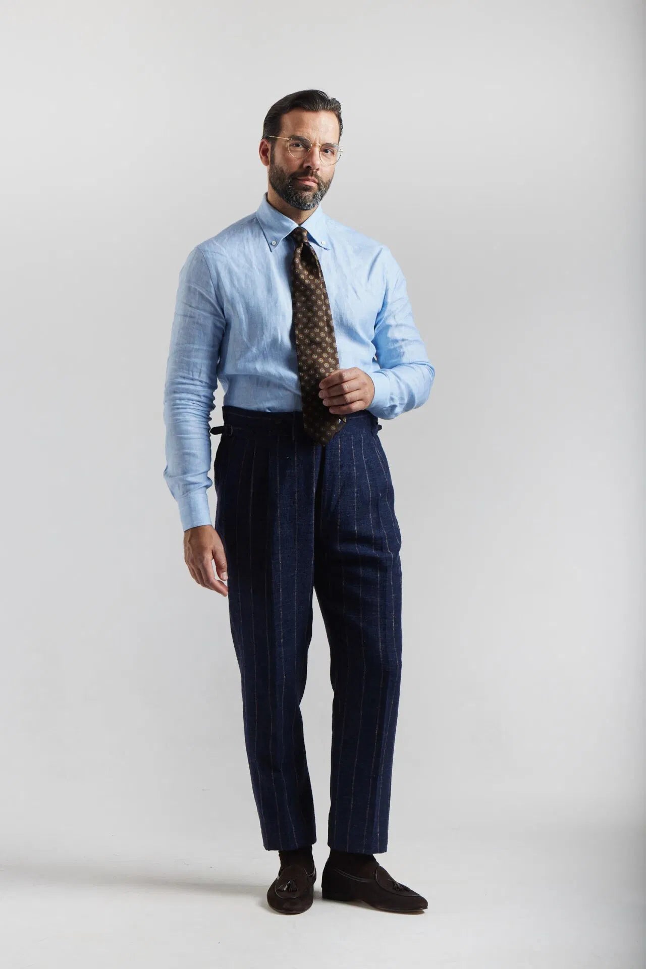 Navy blue double-breasted suit in Ferla fabric with a pinstripe pattern