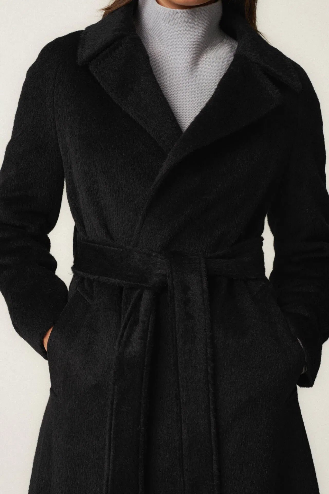 Baby Llama's Black Coat