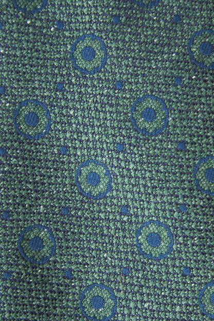 Cravate bordeaux clair à motifs géométriques en soie brute