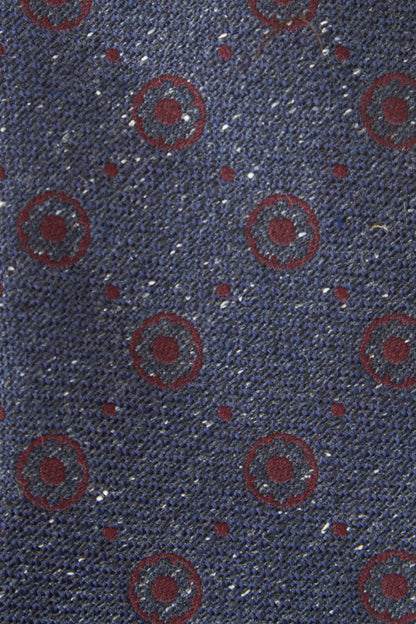 Cravate bordeaux clair à motifs géométriques en soie brute