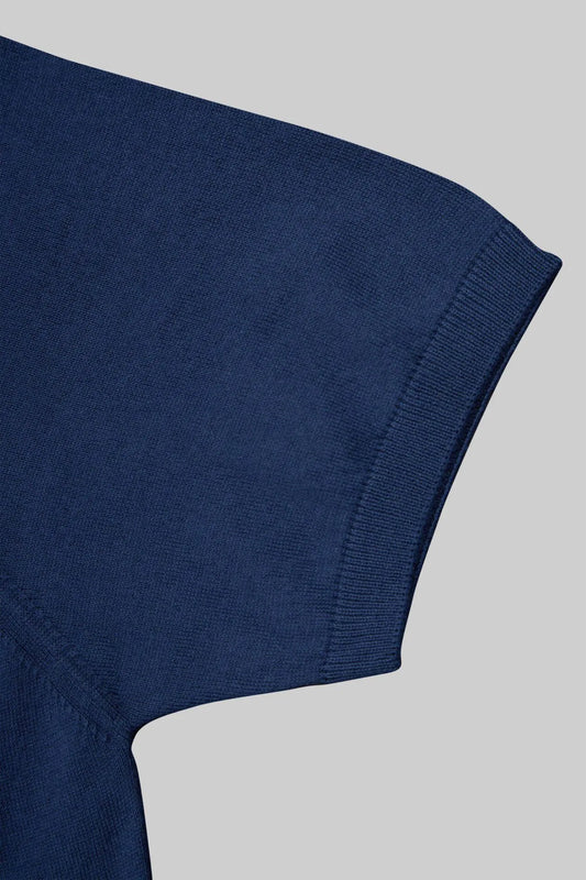 Polo sans boutons en tricot bleu marine 