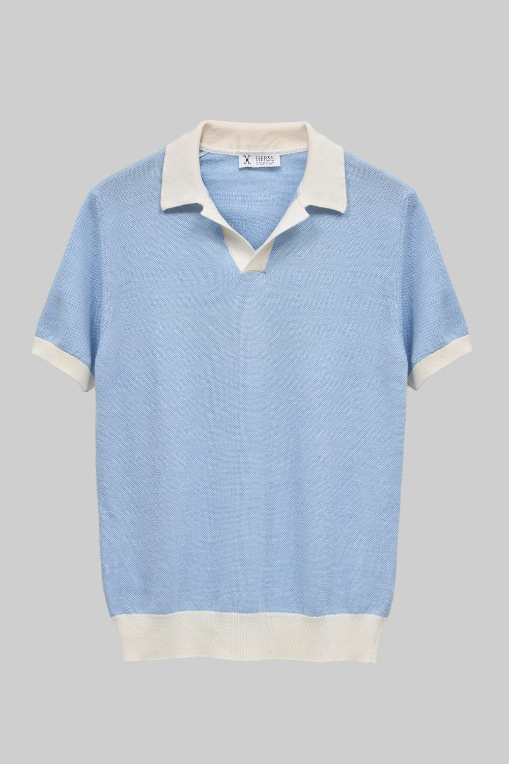 Light blue knit polo shirt with contrast collar 
