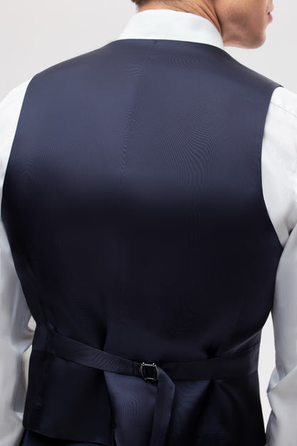 Gray houndstooth vest with beige overcheck