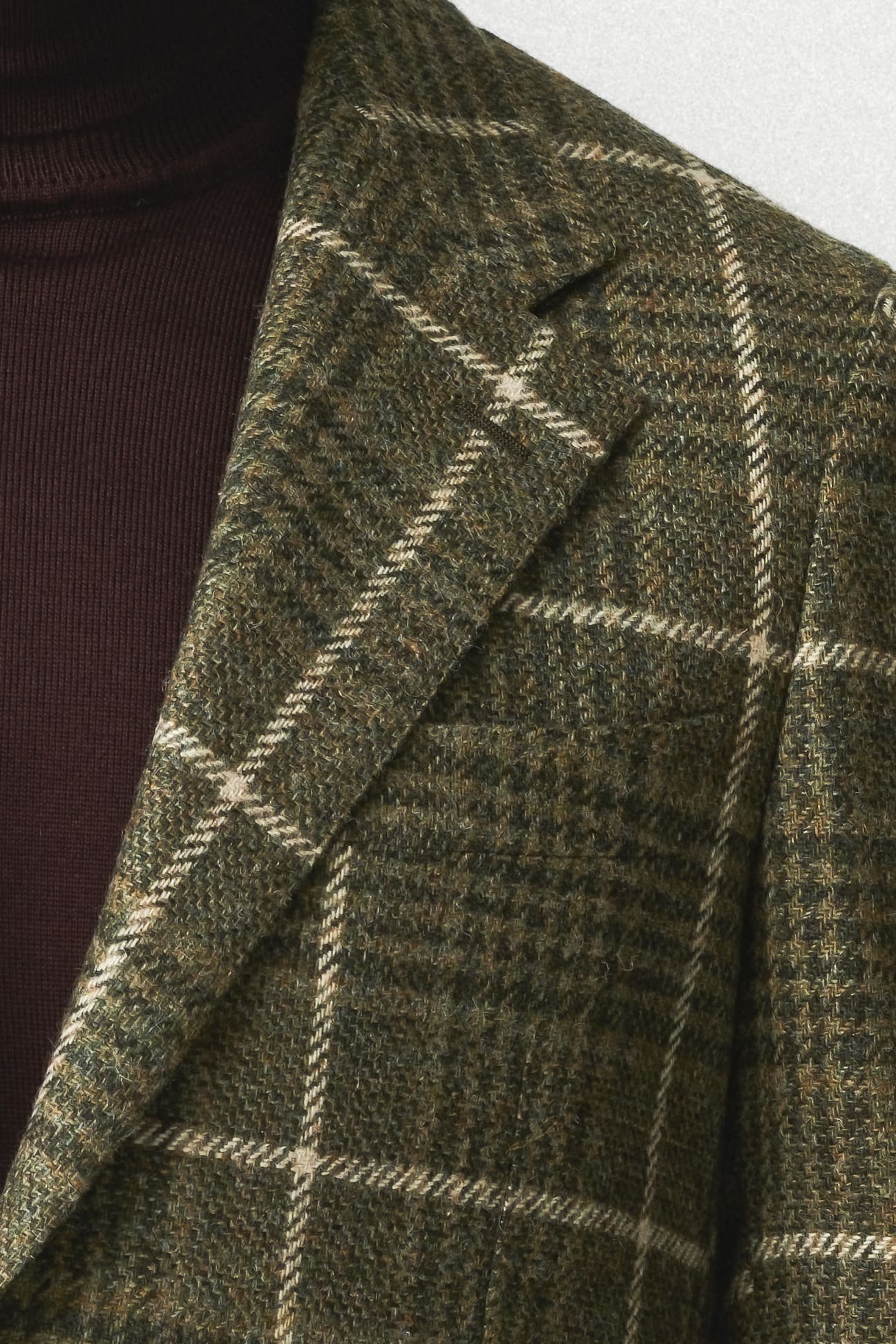 Veste en laine à carreaux verts
