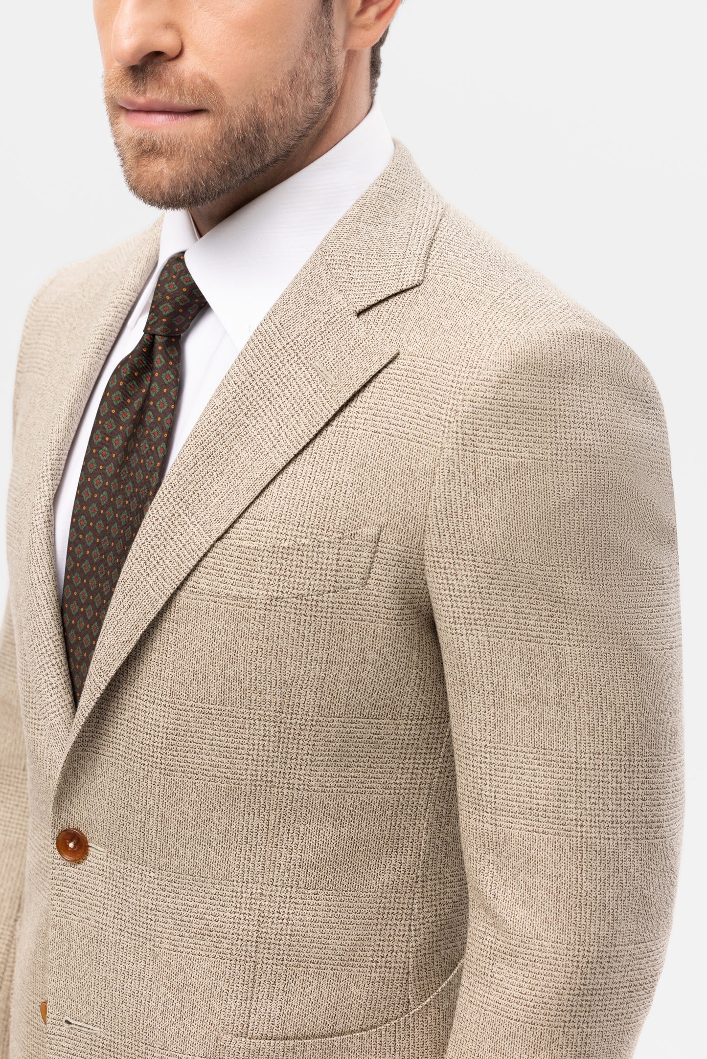 Beżowy garnitur z wełny w kratę Glencheck