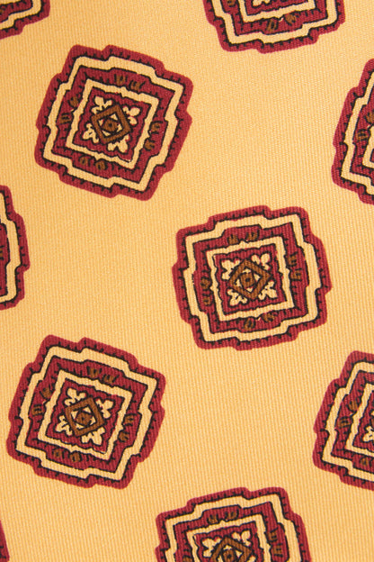 Yellow silk tie with ornaments